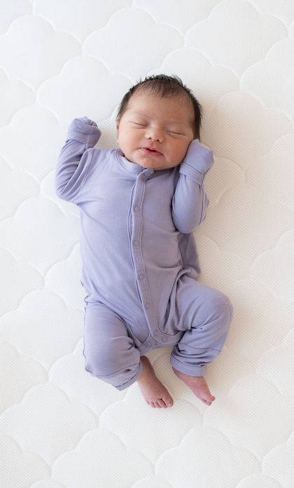 baby on mattress