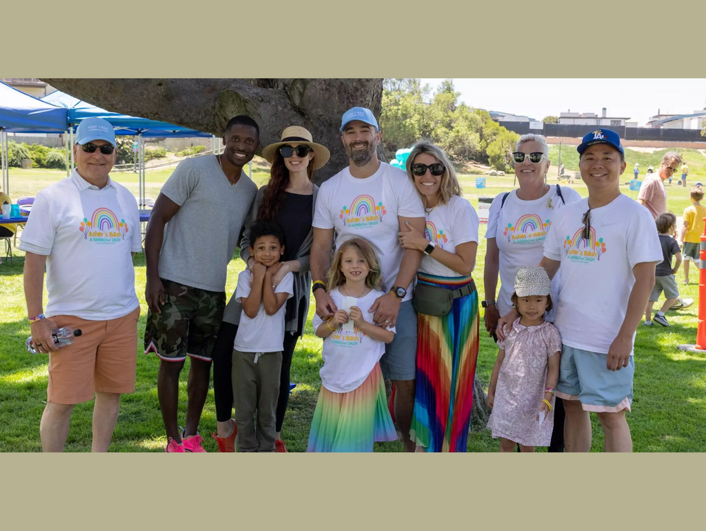 Link to cover photo for Asher's Bash and Rainbow Dash, the community fun run that Heather and Josh Johnston hosted with the Pediatric Cancer Research Foundation to honor their baby Asher's memory 