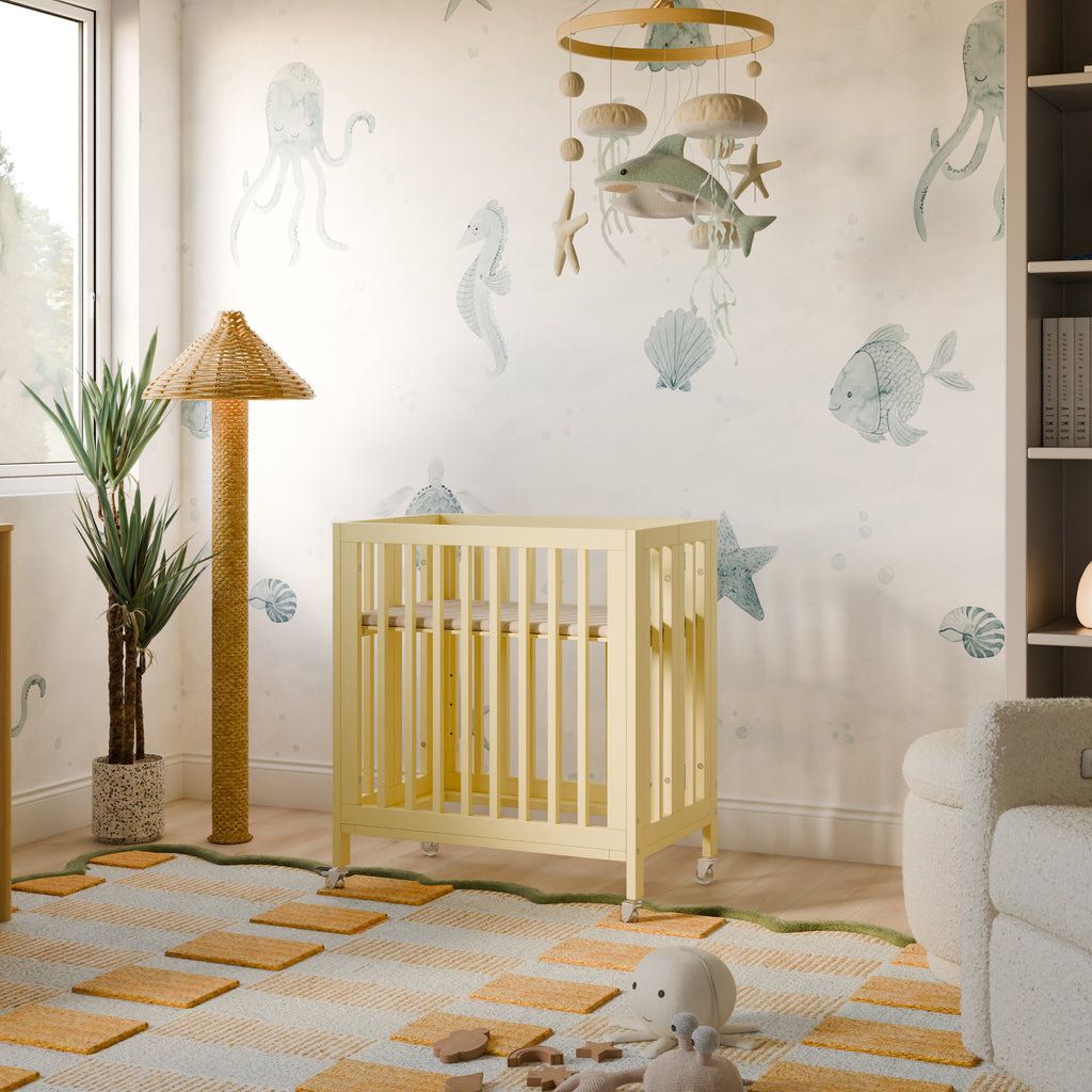 M30880PY,Babyletto,Rolli 9-in-1 Convertible All-Stages® Crib w/ Bassinet & Toddler Bed Kits in Pale Yellow