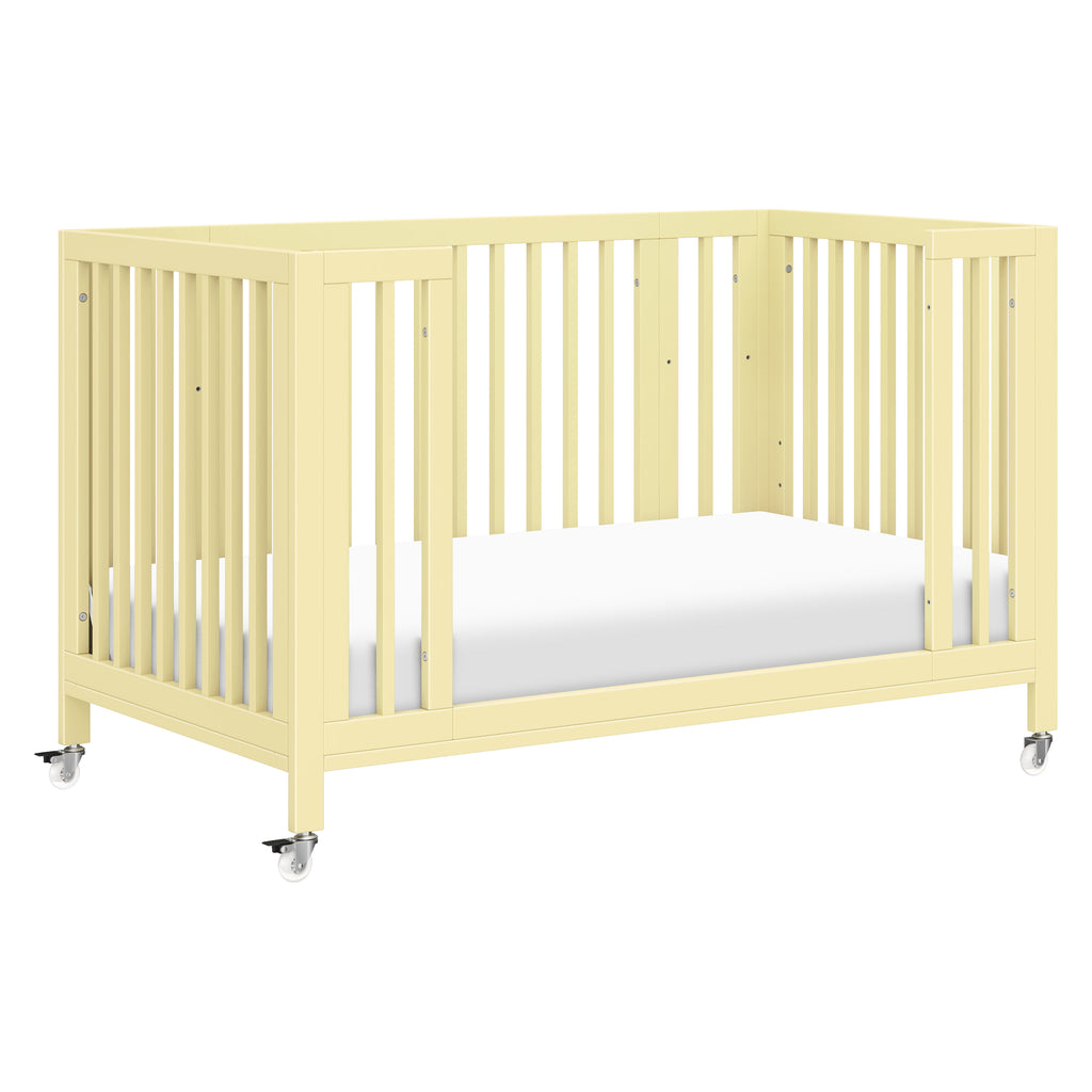 M30880PY,Babyletto,Rolli 9-in-1 Convertible All-Stages® Crib w/ Bassinet & Toddler Bed Kits in Pale Yellow