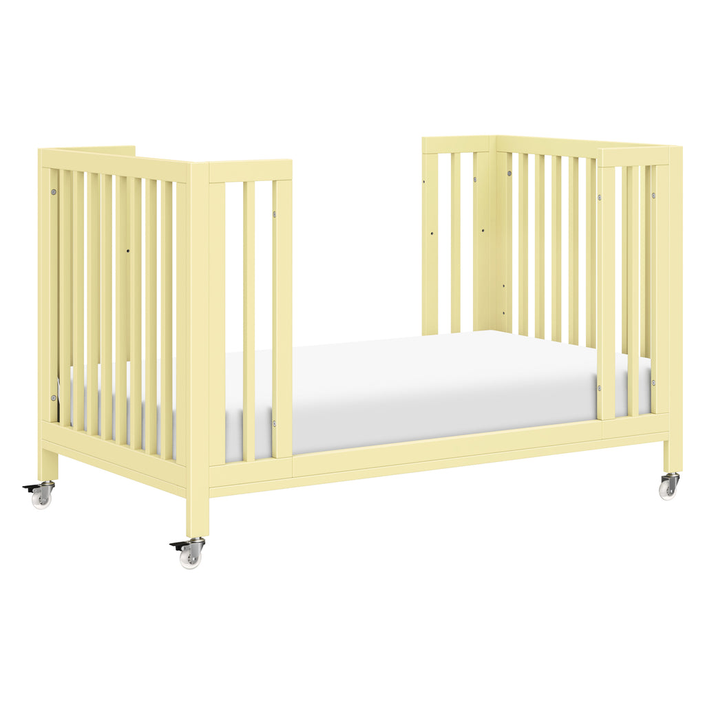 M30880PY,Babyletto,Rolli 9-in-1 Convertible All-Stages® Crib w/ Bassinet & Toddler Bed Kits in Pale Yellow