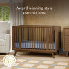 M15980NL,Babyletto,Palma 8-in-1 Convertible All-Stages® Crib w/ Bassinet & Toddler Bed Kits in Natural Walnut