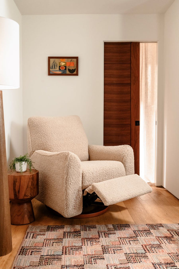 image of reclined white chair in a nursery room