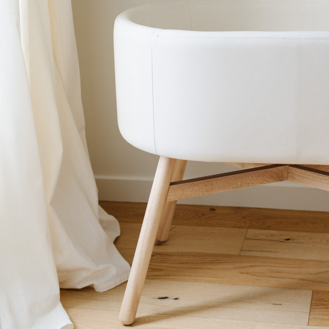 M26834GYLB,Babyletto,babyletto x GATHRE Capsule Bassinet in Ivory