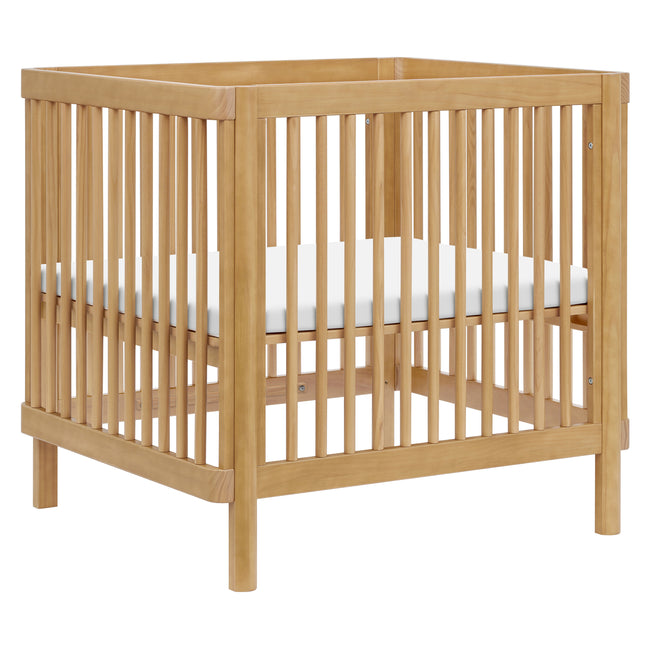 M29880HY,Babyletto,Pogo 8-in-1 Convertible Crib w/ Bassinet & Toddler Bed Kits in Honey