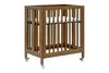 M30880NL,Babyletto,Rolli 9-in-1 Convertible All-Stages® Crib w/ Bassinet & Toddler Bed Kits in Natural Walnut