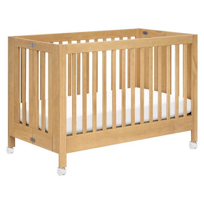 M6601HY,Babyletto,Maki Full-Size Folding Crib w/ Toddler Bed Conversion Kit in Honey