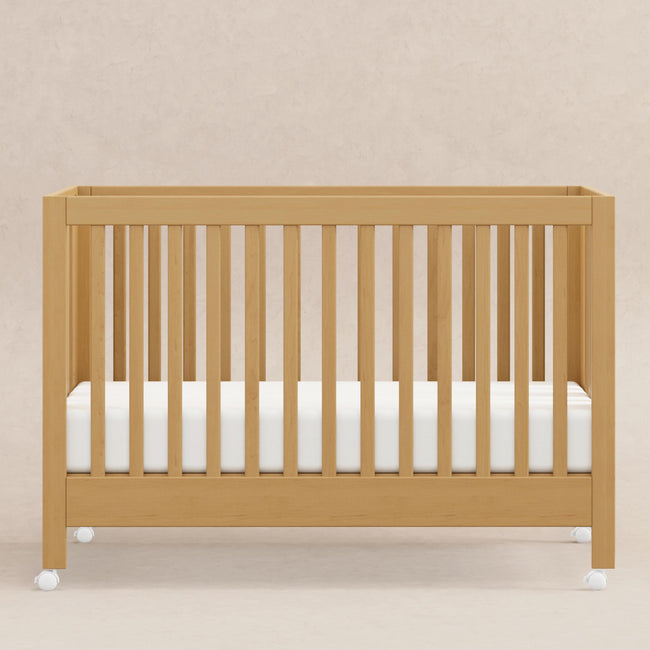 M6601HY,Babyletto,Maki Full-Size Folding Crib w/ Toddler Bed Conversion Kit in Honey