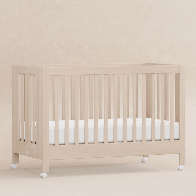 M6601NX,Babyletto,Maki Full-Size Folding Crib w/Toddler Bed Conversion Kit in Washed Natural