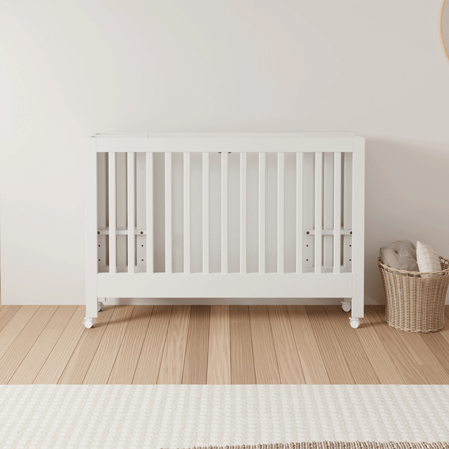 M6601W,Babyletto,Maki Full-Size Folding Crib w/Toddler Bed Conversion Kit in White Finish