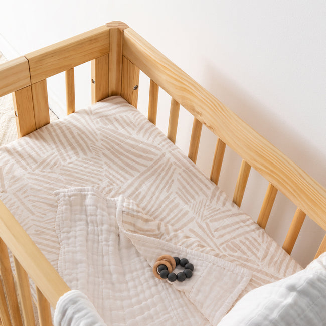 T29234,Babyletto,Oat Stripe Muslin All-Stages Bassinet Sheet in GOTS Certified Organic Cotton