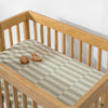 T30534,Babyletto,Moss Stripe Muslin All-Stages Bassinet Sheet in GOTS Certified Organic Cotton