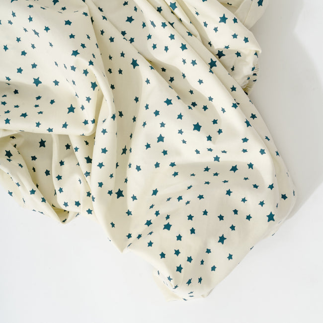 T31035IVS,Babyletto,Doodle Stars Organic Brushed Cotton Crib Sheet in Ivory with Navy Stars