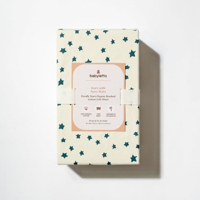 T31035IVS,Babyletto,Doodle Stars Organic Brushed Cotton Crib Sheet in Ivory with Navy Stars