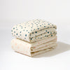 T31035IVS,Babyletto,Doodle Stars Organic Brushed Cotton Crib Sheet in Ivory with Navy Stars