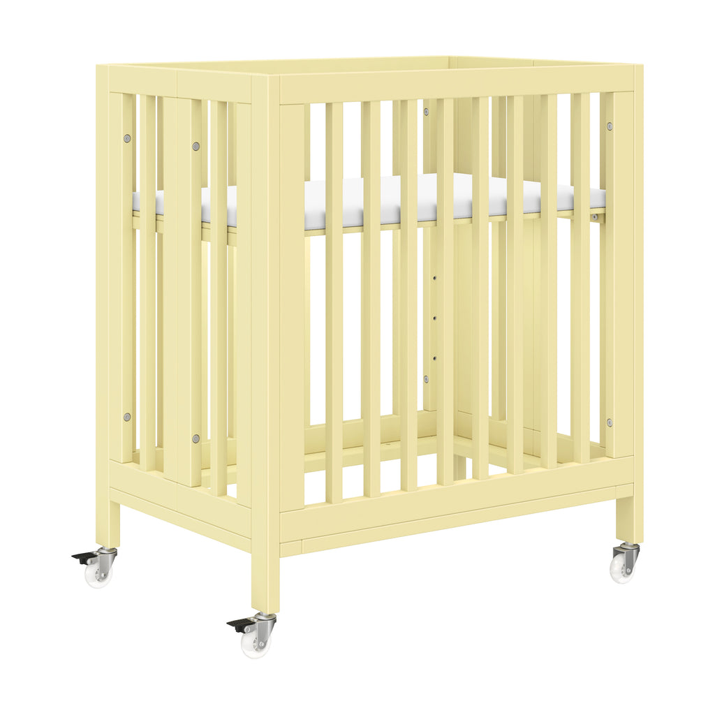 M30880PY,Babyletto,Rolli 9-in-1 Convertible All-Stages® Crib w/ Bassinet & Toddler Bed Kits in Pale Yellow