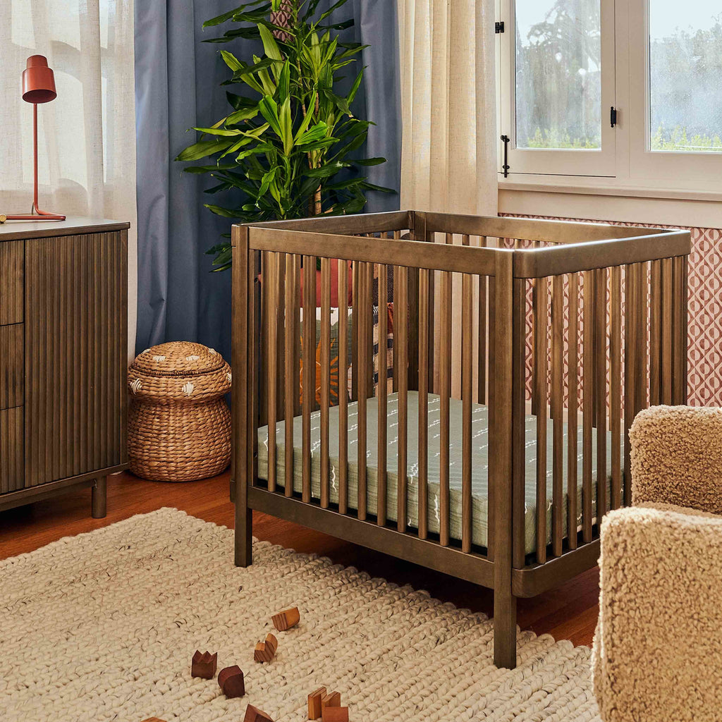 M29880NL,Babyletto,Pogo 8-in-1 Convertible Crib w/All-Stages Conversion Kits in Natural Walnut