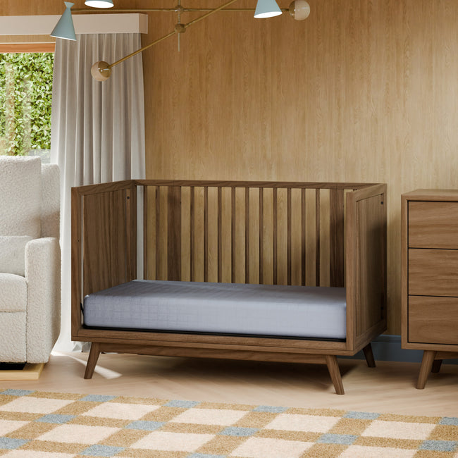 M15980NL,Babyletto,Palma 8-in-1 Convertible All-Stages® Crib w/ Bassinet & Toddler Bed Kits in Natural Walnut