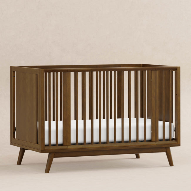 M15980NL,Babyletto,Palma 8-in-1 Convertible All-Stages® Crib w/ Bassinet & Toddler Bed Kits in Natural Walnut