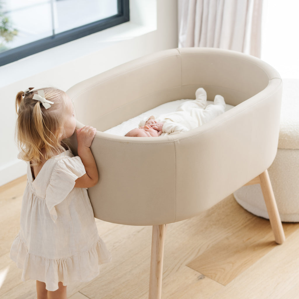 M26834GMLB,babyletto x GATHRE Capsule Bassinet in Millet