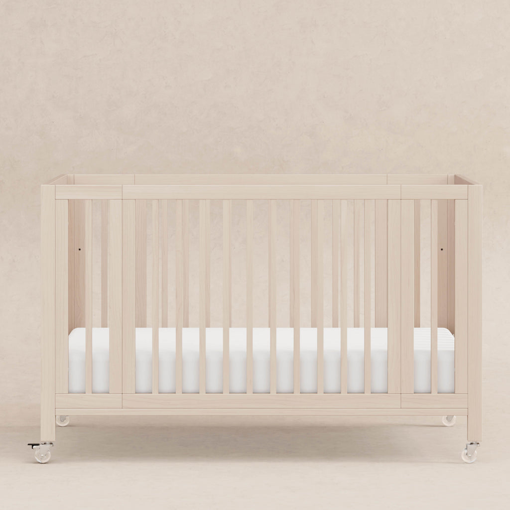 Rolli 9-in-1 Convertible All-Stages® Crib with Bassinet & Toddler Bed Conversion Kits