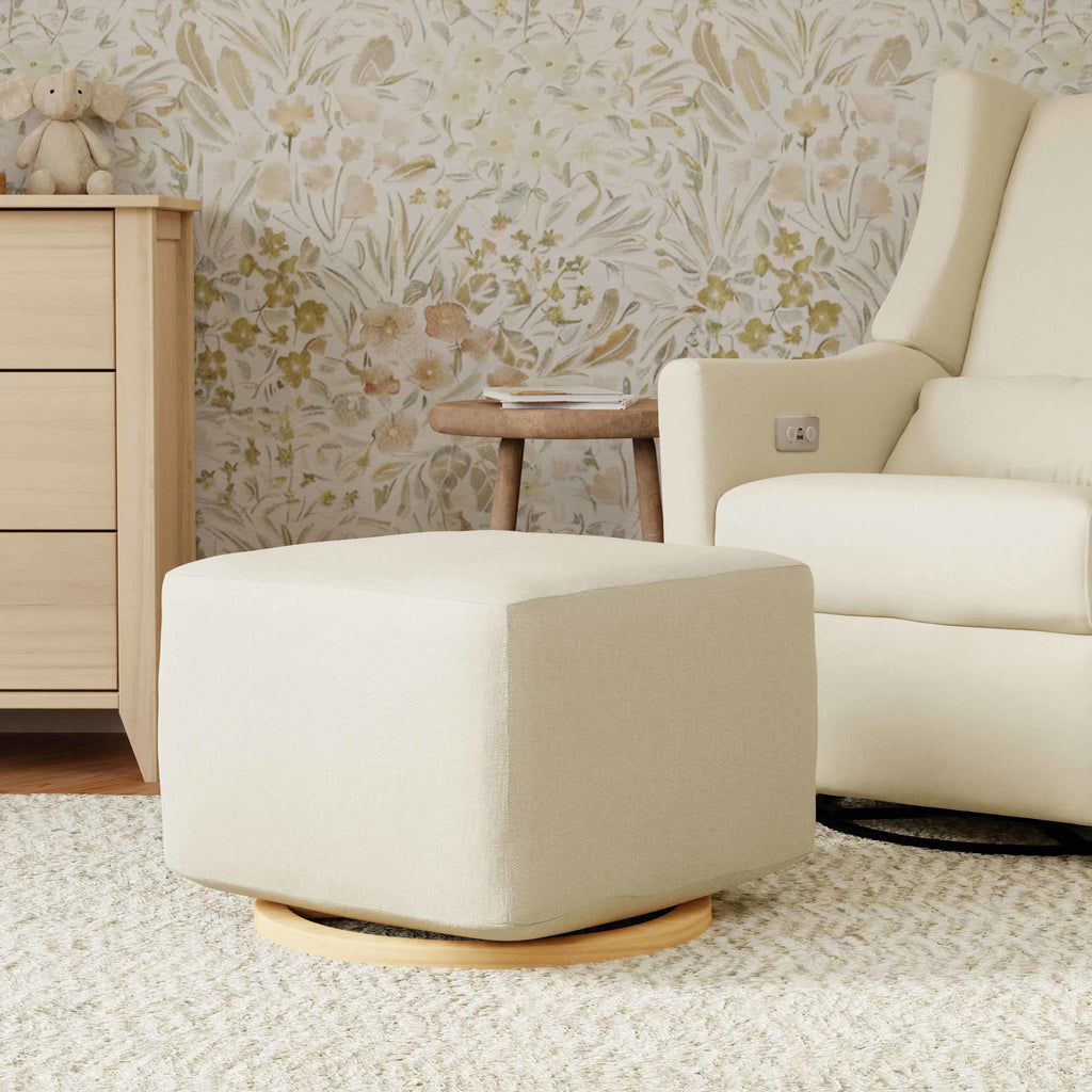 M26385PCMEWLB,Babyletto,Kiwi Gliding Ottoman in Performance Cream Eco-Weave w/ Light Wood Base