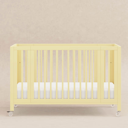 M30880PY,Babyletto,Rolli 9-in-1 Convertible All-Stages® Crib w/ Bassinet & Toddler Bed Kits in Pale Yellow