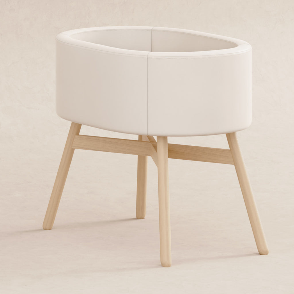 M26834GYLB,Babyletto,babyletto x GATHRE Capsule Bassinet in Ivory