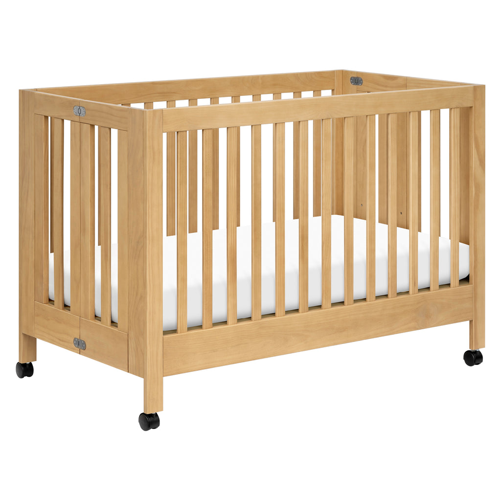 M6601HY,Babyletto,Maki Full-Size Folding Crib w/ Toddler Bed Conversion Kit in Honey