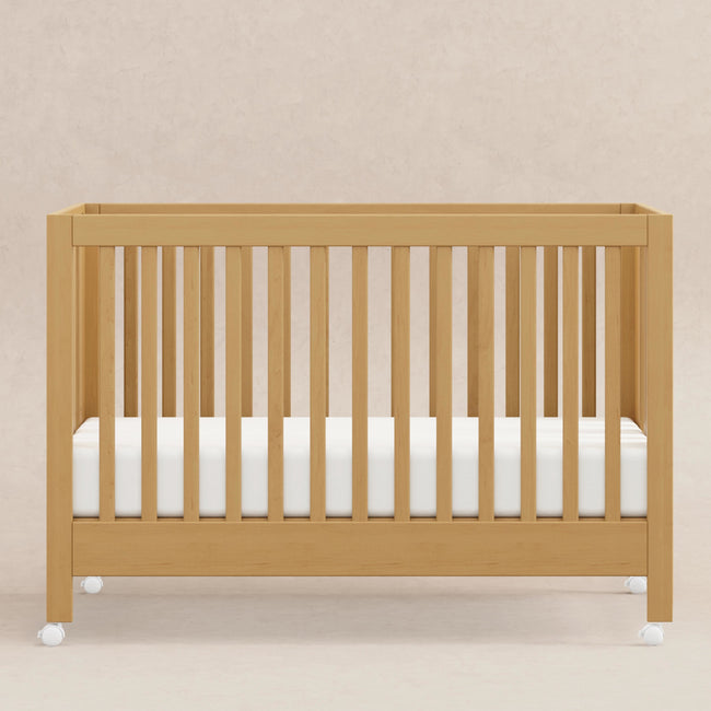 M6601HY,Babyletto,Maki Full-Size Folding Crib w/ Toddler Bed Conversion Kit in Honey