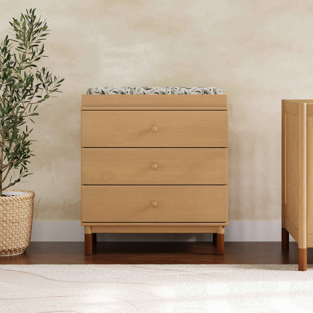 M12923HYVTL,Babyletto,Gelato 3-Drawer Changer Dresser  leather feet w/Removable Changing Tray in Honey