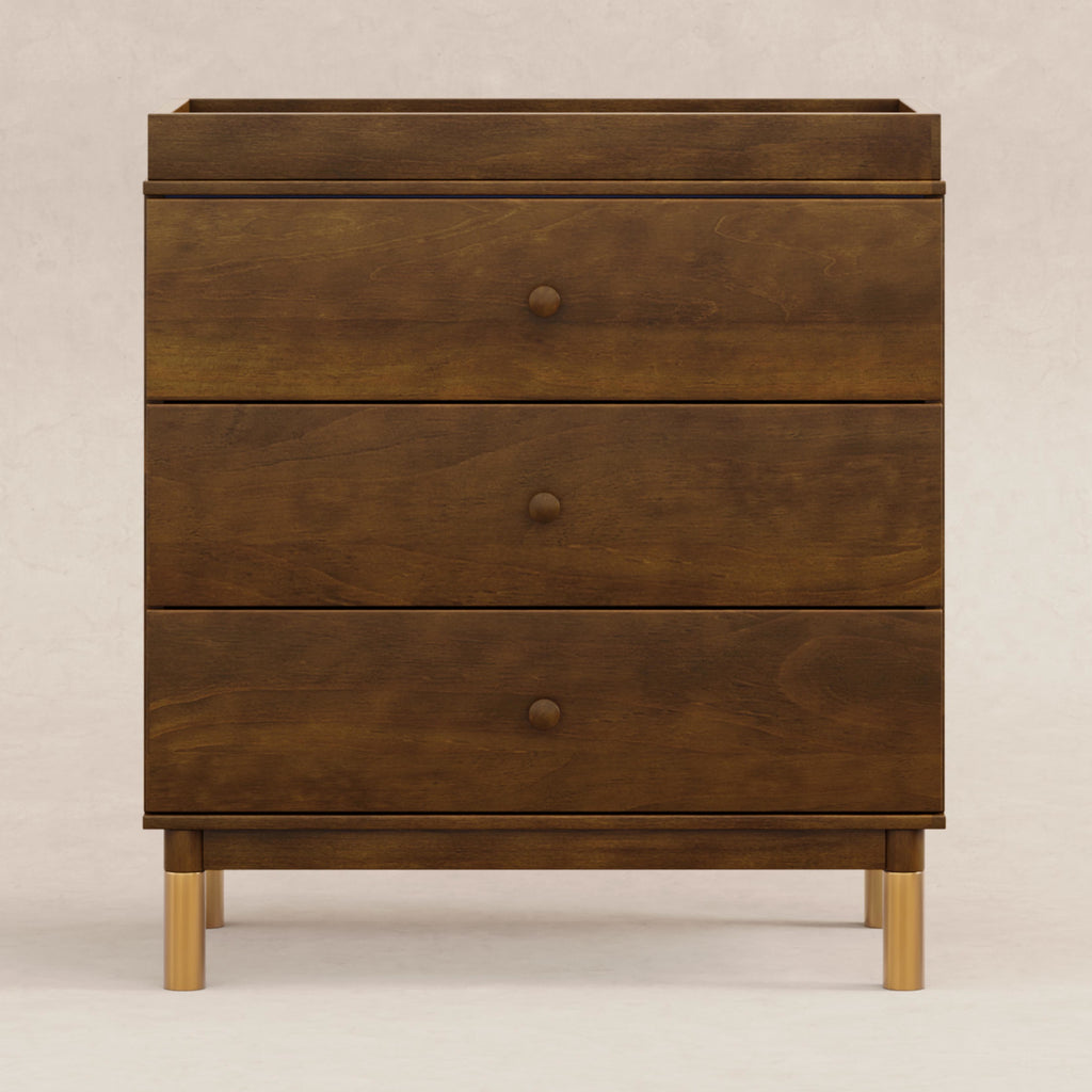 M12923NLGLD,Babyletto,Gelato 3-Drawer Changer Dresser  Gold Feet w/Removable Changing Tray in Natural Walnut