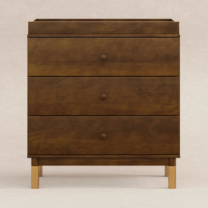 M12923NLGLD,Babyletto,Gelato 3-Drawer Changer Dresser  Gold Feet w/Removable Changing Tray in Natural Walnut