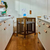 M30880NL,Babyletto,Rolli 9-in-1 Convertible All-Stages® Crib w/ Bassinet & Toddler Bed Kits in Natural Walnut