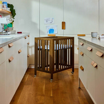 M30880NL,Babyletto,Rolli 9-in-1 Convertible All-Stages® Crib w/ Bassinet & Toddler Bed Kits in Natural Walnut