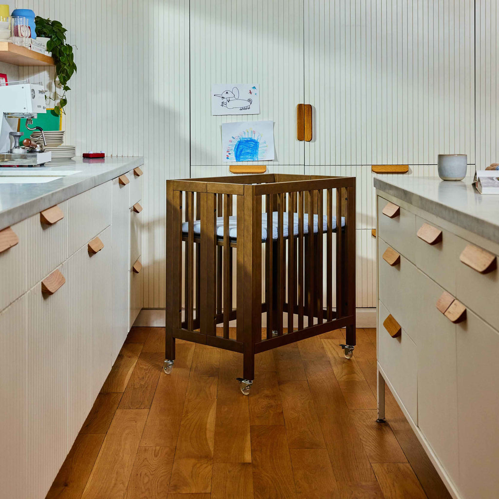 M30880NL,Babyletto,Rolli 9-in-1 Convertible All-Stages® Crib w/ Bassinet & Toddler Bed Kits in Natural Walnut