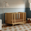M15980HY,Babyletto,Palma 8-in-1 Convertible All-Stages® Crib w/ Bassinet & Toddler Bed Kits in Honey