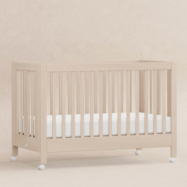 M6601NX,Babyletto,Maki Full-Size Folding Crib w/Toddler Bed Conversion Kit in Washed Natural