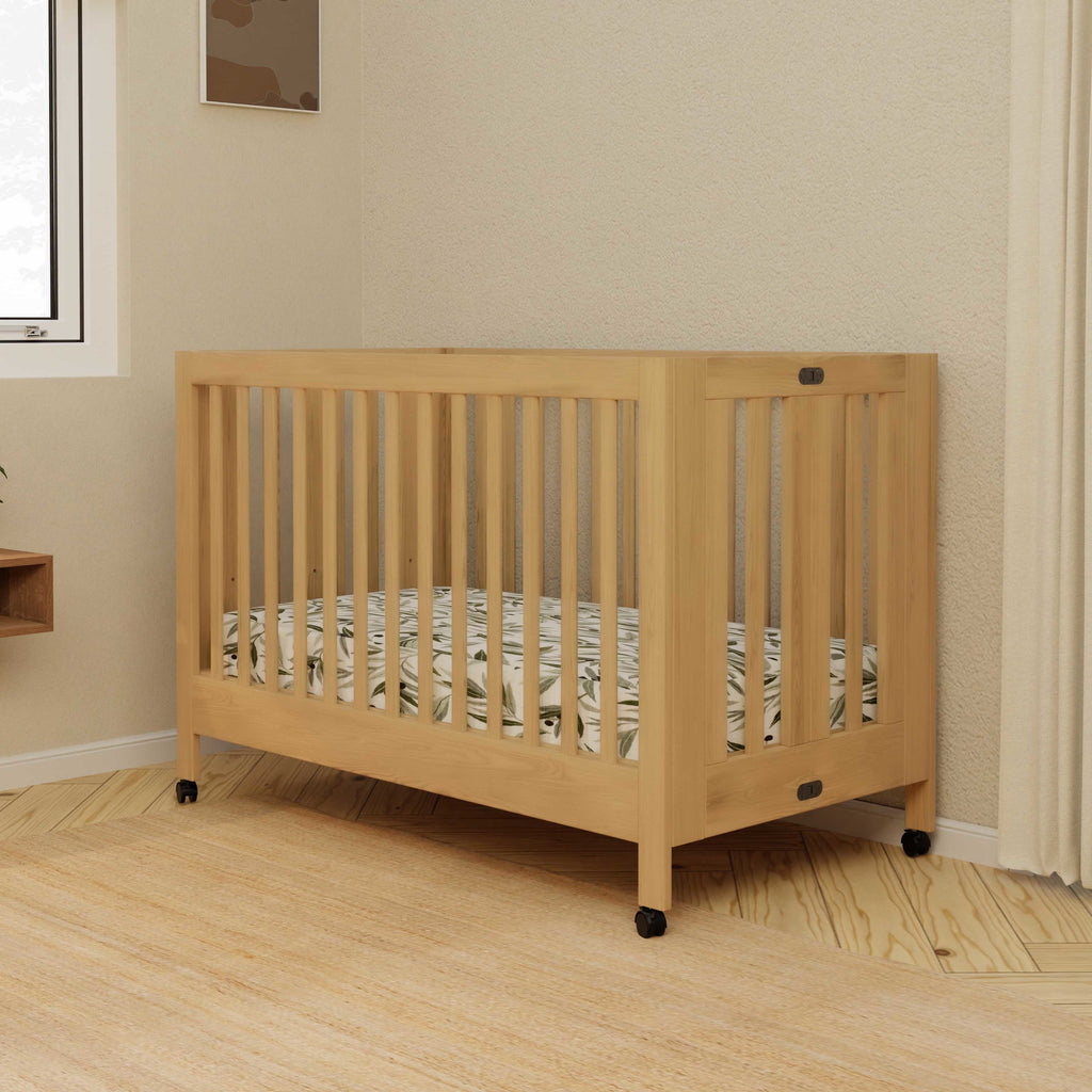 M6601HY,Babyletto,Maki Full-Size Folding Crib w/ Toddler Bed Conversion Kit in Honey