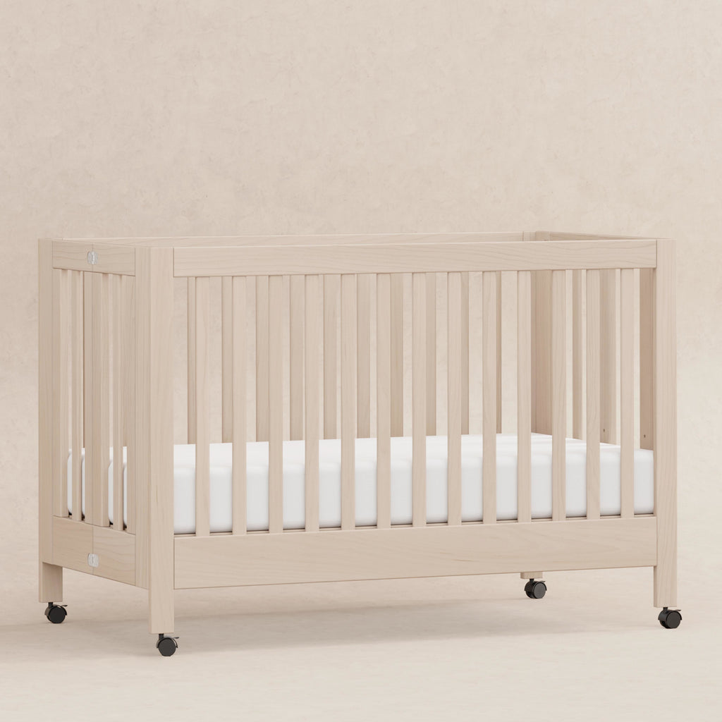 M6601NX,Babyletto,Maki Full-Size Folding Crib w/Toddler Bed Conversion Kit in Washed Natural