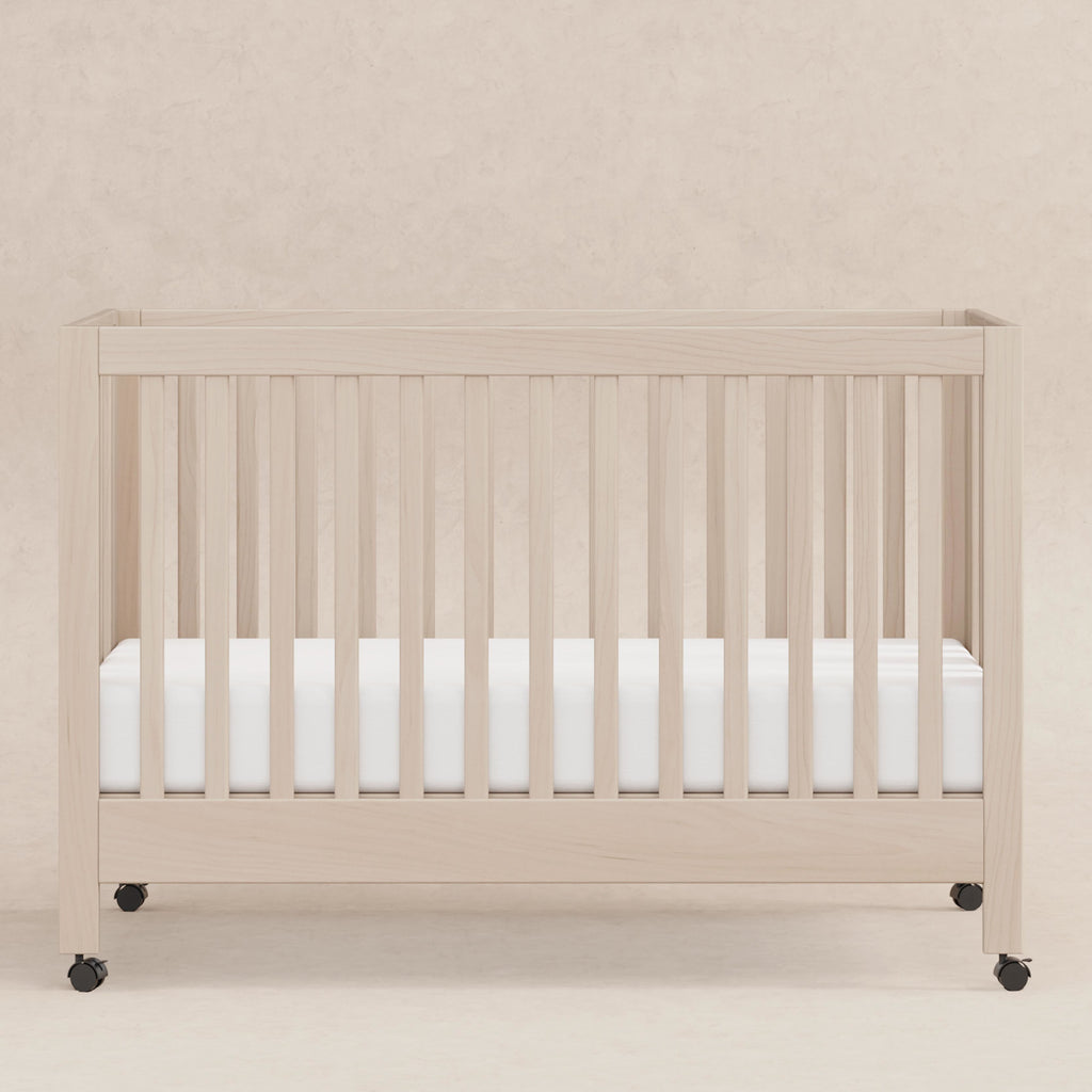 M6601NX,Babyletto,Maki Full-Size Folding Crib w/Toddler Bed Conversion Kit in Washed Natural