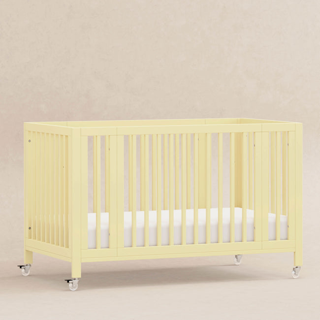 M30880PY,Babyletto,Rolli 9-in-1 Convertible All-Stages® Crib w/ Bassinet & Toddler Bed Kits in Pale Yellow