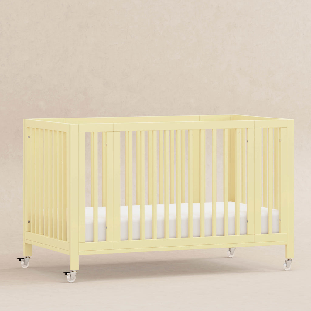 M30880PY,Babyletto,Rolli 9-in-1 Convertible All-Stages® Crib w/ Bassinet & Toddler Bed Kits in Pale Yellow