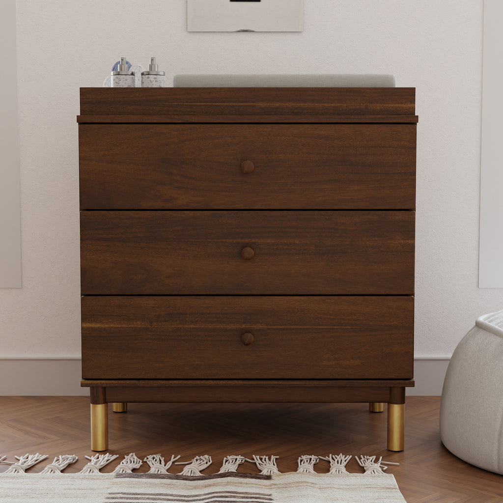 M12923NLGLD,Gelato 3-Drawer Changer Dresser  Gold Feet w/Removable Changing Tray in Natural Walnut